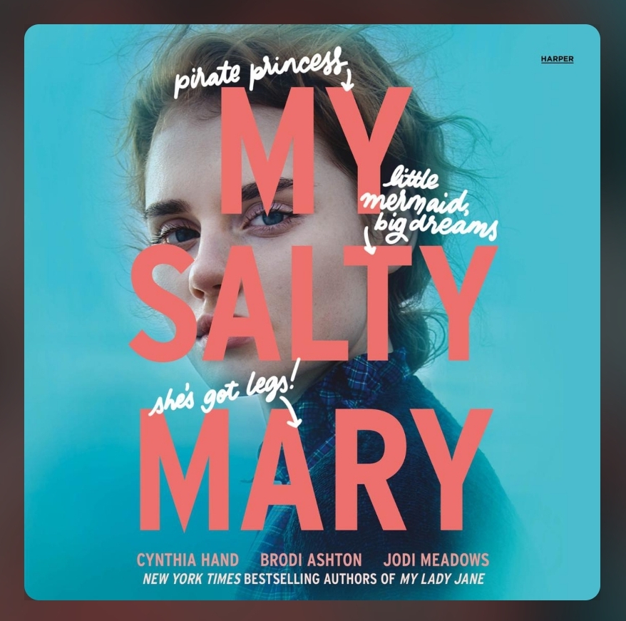 screenshot of My Salty Mary: a light blue background with a young woman looking over her shoulder. The title is in pink across her face, with white text elaborating on it. The white text says "pirate princess," "little mermaid, big dreams," and "she's got legs!"
