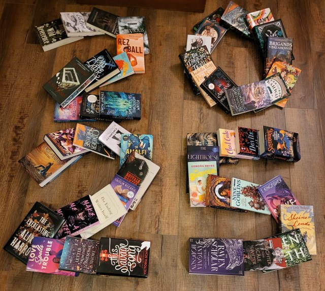 a photo of the numbers 2025 built out of books arranged on the floor